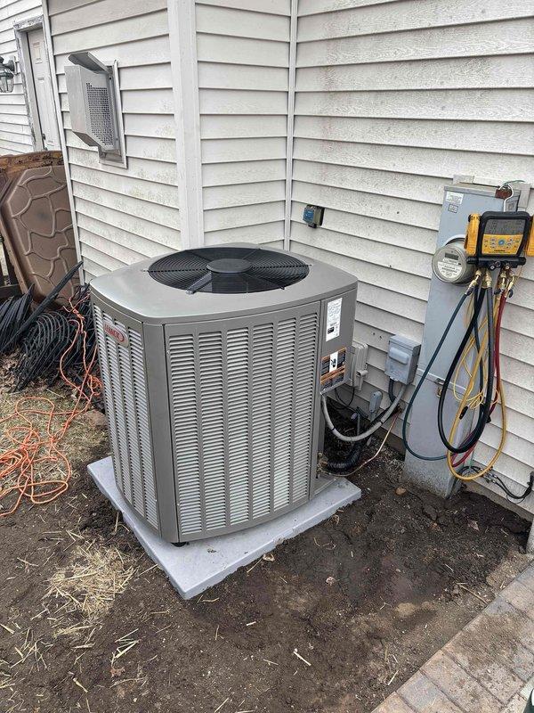 Successfully relocated customer's Lennox AC condenser unit around corner of house, extending refrigerant lineset and electrical connections to accommodate new position. Unit was properly installed on concrete pad with appropriate clearances, and system was tested for proper operation following the relocation.
