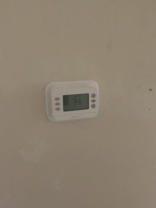 Responded to service call for Lennox furnace that would not operate continuously without manual power cycling. Diagnosed issue with thermostat communication and replaced dirty air filter which was restricting proper airflow. System now operating normally with proper cycling and maintaining set temperature of 74°F.