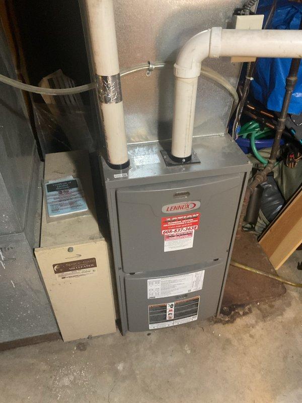 Responded to service call for Lennox furnace that would not operate continuously without manual power cycling. Diagnosed issue with thermostat communication and replaced dirty air filter which was restricting proper airflow. System now operating normally with proper cycling and maintaining set temperature of 74°F.