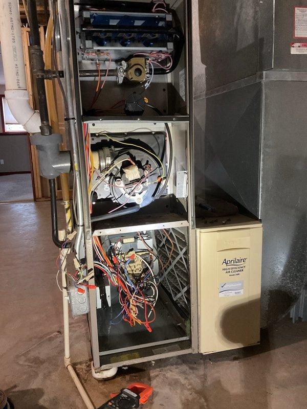 Responded to service call for furnace displaying E298 error on Nest thermostat. Inspection of Aprilaire unit revealed missing C-wire connection required for proper thermostat operation. Installed and connected C-wire from furnace control board to thermostat, resolving the error code and restoring normal heating function.