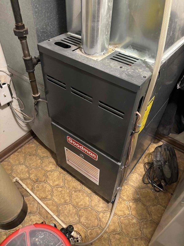 Responded to no heat complaint on Goodman furnace. Diagnosed dirty flame sensor causing heating failure. Cleaned flame sensor, verified proper ignition and heating operation confirmed with temperature differential testing (supply air 123.8°F, return air 69.8°F).