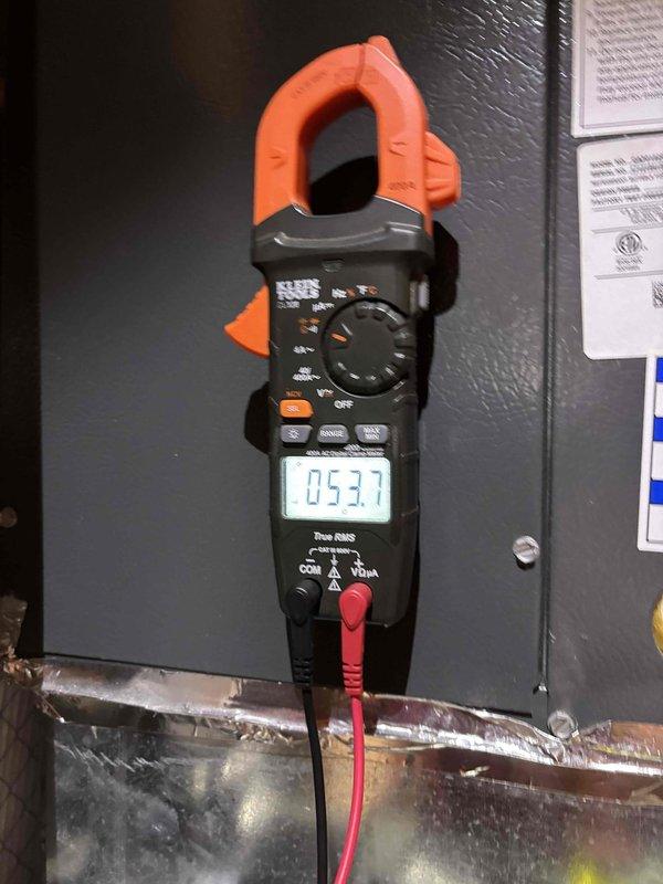 Responded to no heat call for Goodman gas furnace. Diagnosed dirty flame sensor as the cause of heating failure. Performed thorough cleaning of the flame sensor. Verified proper system operation using clamp meter to measure electrical parameters and dual temperature probes to confirm appropriate temperature differential. Unit now functioning correctly.