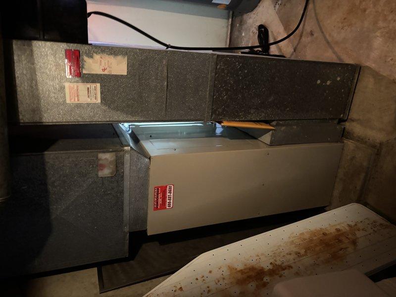 Responded to no-heat call for Lennox furnace system. Diagnosed failed inducer motor causing heat failure. Presented customer with replacement options and provided quote for new furnace installation as the unit appears to be aging with visible wear in the utility area.
