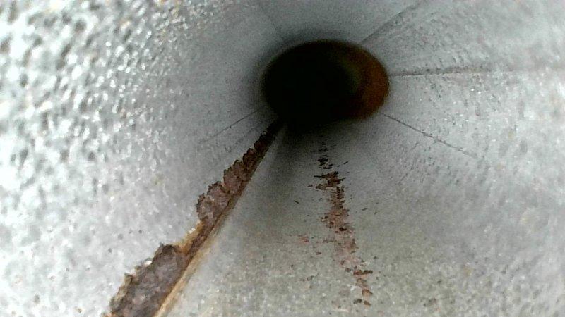 Responded to no-heat complaint on Goodman furnace. Inspection revealed significant rust and corrosion inside heat exchanger flue pipe, indicating potential heat exchanger failure. Recommended complete furnace replacement due to safety concerns; provided customer with replacement quote.