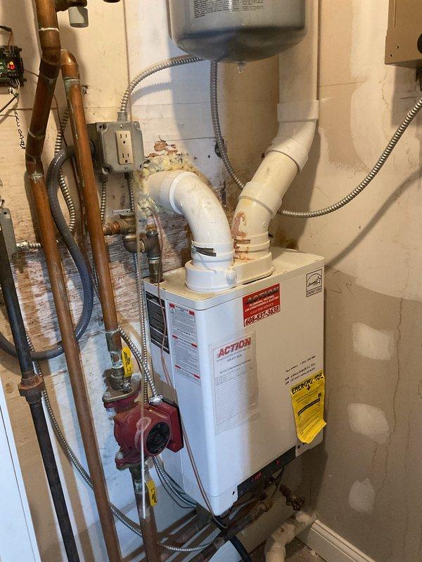 Responded to no heat call for an Action boiler system. Diagnosed issue as a clogged condensate trap causing system failure. Service included cleaning the condensate trap and igniter, restoring proper boiler operation and heat to the residence.