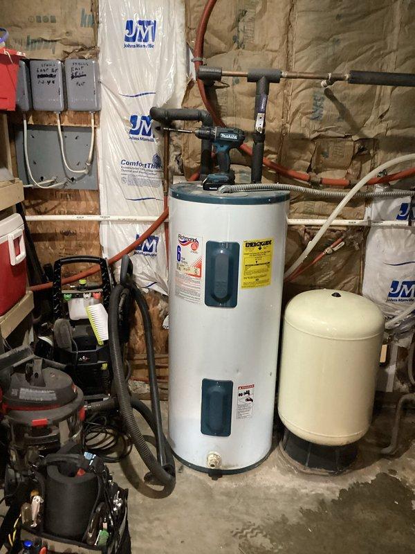 Responded to no-heat complaint for LP-fueled Navien boiler system located in barn. Diagnostic testing revealed low water pressure as root cause. Restored proper pressure levels by adding water to the system, then monitored operation for approximately 20 minutes to confirm proper function of both space heating and domestic hot water storage.
