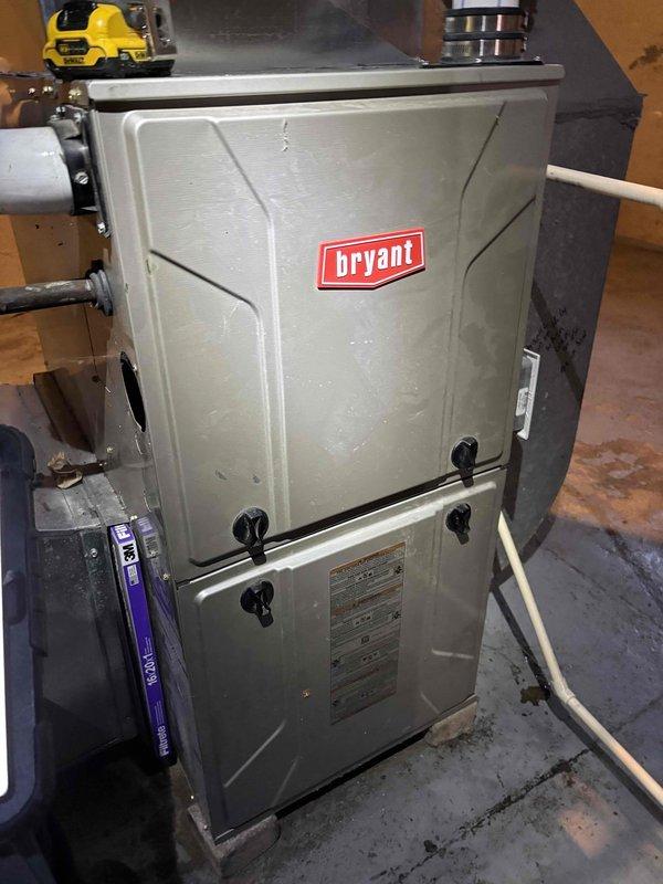 Responded to no heat call for Bryant furnace showing 3 fast/1 slow error code. Diagnostic testing revealed temperature differential of 33.3°F (102.3°F supply, 69.0°F return). Located and cleared plugged condensate drain, restoring normal system operation and heat function.