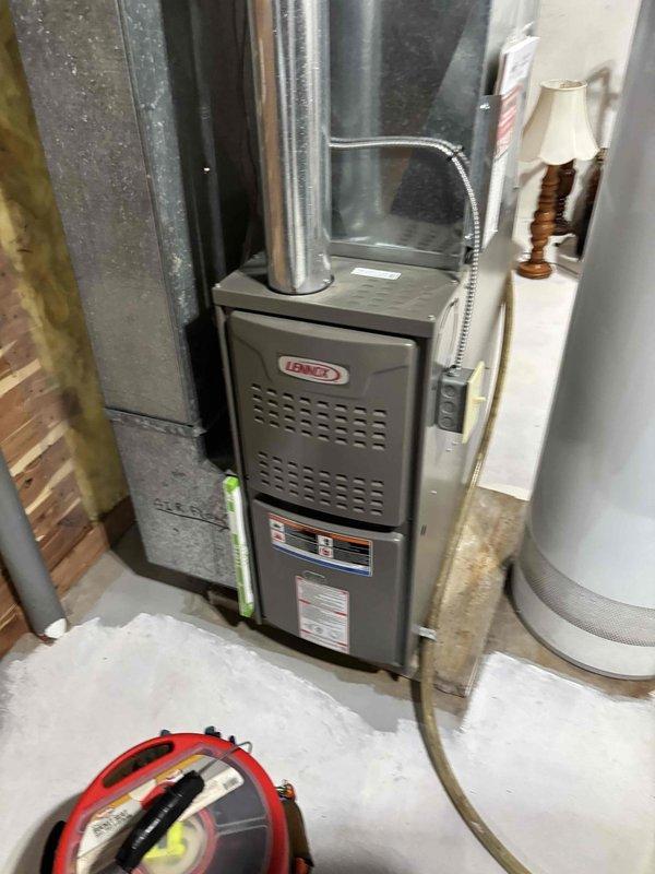 Responded to no heat complaint where furnace was not consistently igniting. Diagnosed dirty flame sensor as the root cause. Cleaned flame sensor thoroughly, resulting in restored operation and proper heat output, verified with digital temperature readings.