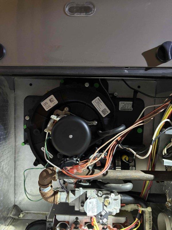 Responded to no heat service call for Luxaire furnace unit. Diagnosed failed inducer motor preventing system startup. Replaced inducer motor assembly and verified proper system operation, restoring heat to residence. Also provided thermostat operation instructions to resolve sleep mode issue.