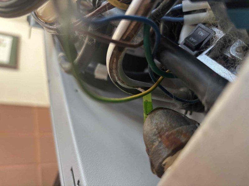 Responded to service call for furnace displaying PF trouble code with no heat. Diagnosed issues with flame sensor and leaking drain tube. Performed thorough cleaning of flame sensor to restore proper operation and ordered replacement drain tube to address condensate leak. Inspection revealed significant corrosion on internal components and dust accumulation on wiring system requiring attention.