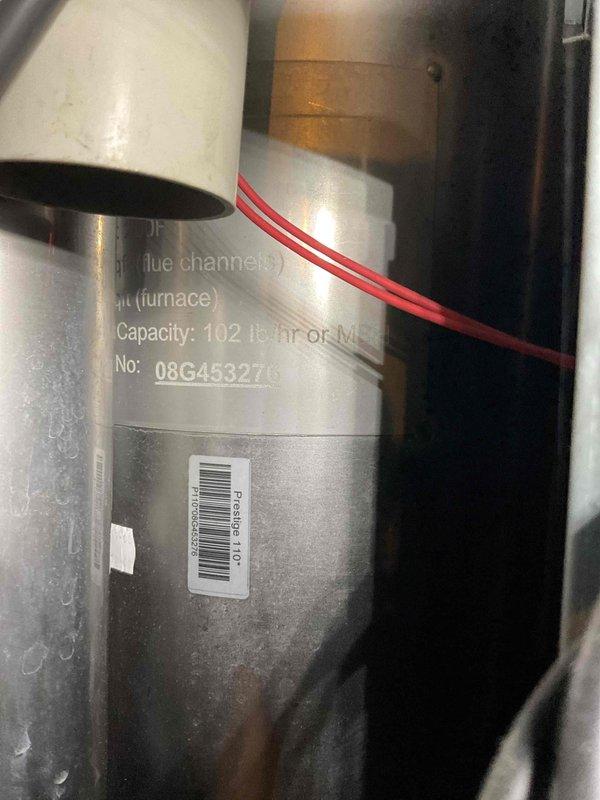 Responded to service call for gas odor at inline boiler system. Performed diagnostic inspection, identifying issues with igniter requiring cleaning. Completed maintenance including igniter cleaning, trap cleaning, and proper pressurization of captive air tank. System tested for proper operation after service with all functions restored.
