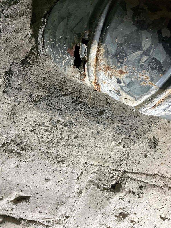 # HVAC Service Report - Furnace Inspection

Responded to service call regarding suspected heat exchanger crack and potential carbon monoxide presence in residence. Performed comprehensive furnace inspection using video scope equipment to examine heat exchanger for cracks or failures. Visual inspection revealed rust accumulation on heat exchanger components but confirmed no visible cracks or breaches present. Inspected blower cabinet and verified no water infiltration or moisture damage in compartment.

Conducted carbon monoxide testing throughout living space to verify safe levels. Extended safety inspection to include water heater and kitchen range appliances to identify any potential CO sources. Verified proper combustion and venting on all fuel-burning appliances. Confirmed residence ventilation adequate with no excessive air sealing causing combustion air deficiency. Carbon monoxide readings measured at two parts per million, which falls within safe acceptable range.

Documented fi