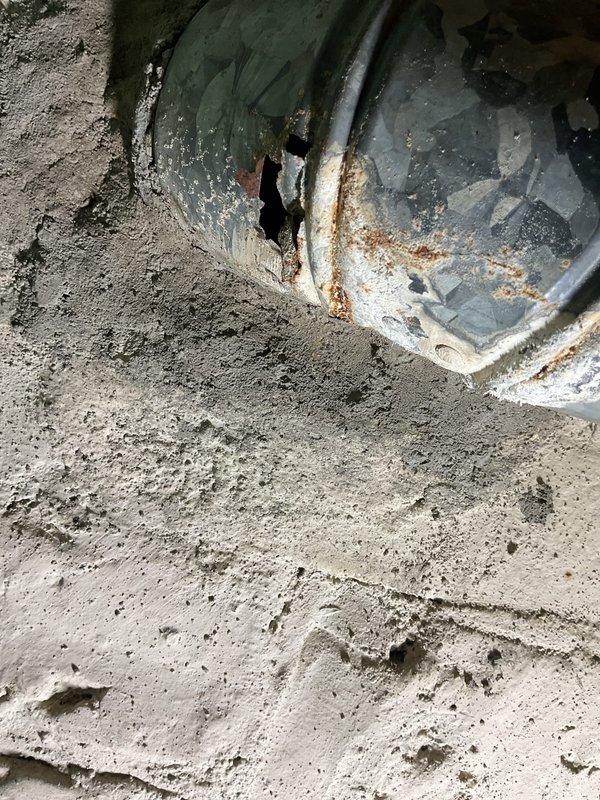 # HVAC Service Report - Furnace Inspection

Responded to service call regarding suspected heat exchanger crack and potential carbon monoxide presence in residence. Performed comprehensive furnace inspection using video scope equipment to examine heat exchanger for cracks or failures. Visual inspection revealed rust accumulation on heat exchanger components but confirmed no visible cracks or breaches present. Inspected blower cabinet and verified no water infiltration or moisture damage in compartment.

Conducted carbon monoxide testing throughout living space to verify safe levels. Extended safety inspection to include water heater and kitchen range appliances to identify any potential CO sources. Verified proper combustion and venting on all fuel-burning appliances. Confirmed residence ventilation adequate with no excessive air sealing causing combustion air deficiency. Carbon monoxide readings measured at two parts per million, which falls within safe acceptable range.

Documented fi