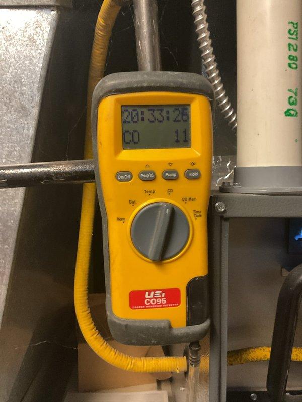 Completed furnace tune-up on 15-year-old unit that was experiencing operational issues. Performed combustion analysis using UEi CO55 analyzer, which showed carbon monoxide reading of 1.1 ppm within acceptable range. Found severely dirty air filter with significant debris accumulation causing restricted airflow, which was likely contributing to reported performance problems. Advised homeowner to replace filters regularly to prevent future issues and maintain system efficiency.