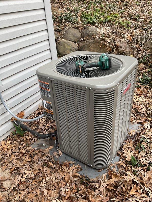 Performed seasonal AC startup on residential condensing unit that had been dormant since installation through the winter months. Verified unit operation, checked refrigerant levels, inspected electrical connections, and confirmed proper airflow through condenser coils and fan assembly.