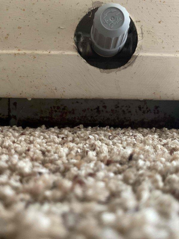 Responded to a boiler system service call to replace a malfunctioning zone valve. Upon inspection, discovered the thermal activating valve was defective with misaligned internal components preventing proper operation. Coordinated water shutoff access through storage units and ordered replacement zone valve through supplier. Successfully removed the failed valve and installed new thermal activating valve to restore proper zone control functionality to the heating system.