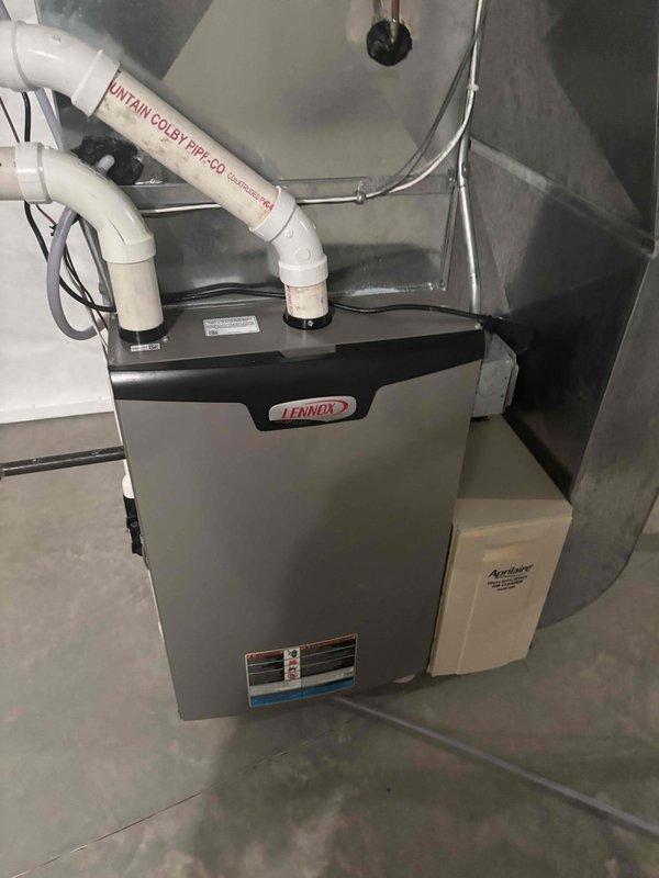 Completed comprehensive furnace tune-up and inspection on Lennox heating system. Replaced furnace filter and installed model #35 filter in Aprilaire 2400 whole-house humidifier system per customer request. Performed standard maintenance procedures including system diagnostics, safety checks, and operational testing. All equipment found to be functioning within normal parameters. Customer inquired about thermostat evaluation and potential humidifier replacement for future consideration.