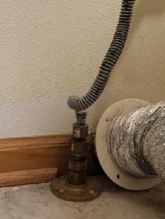 # HVAC Service Completed

Responded to service call to cap off an unused gas line previously connected to a dryer appliance. Upon arrival, located the gas supply line in the utility area where the dryer had been removed or relocated. The flexible gas connector and rigid gas piping were identified running through the floor joists in the mechanical space.

Performed safe gas line capping procedure by shutting off the gas supply at the nearest upstream valve. Disconnected the flexible gas connector from the supply line. Installed an approved gas line cap on the exposed 1/2" gas pipe stub to permanently seal the line. Verified proper threading and applied pipe thread sealant rated for natural gas or propane applications to ensure a leak-free connection.

Conducted pressure test and leak detection using electronic gas detector and soap bubble solution to confirm the integrity of the cap installation. No gas leaks detected at the capped connection point or surrounding gas line fittings. The 