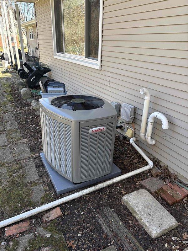 Completed air conditioning installation following initial furnace permit. Installed electrical disconnect box, dedicated breaker, and electrical whip to power new Lennox outdoor condensing unit. Performed system startup procedures and verified refrigerant pressures using digital manifold gauges, confirming proper superheat and subcooling values. Unit operational and cooling system functioning within manufacturer specifications.