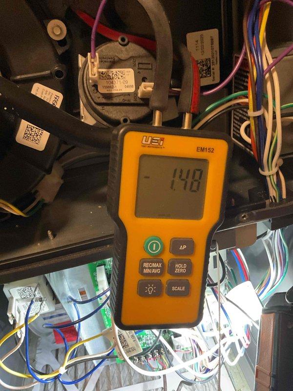 Responded to no-heat call and diagnosed furnace displaying error code 272 indicating pressure switch failure. Verified pressure switch malfunction using digital manometer, which showed readings fluctuating between 1.35 to 51 inches of water column vacuum, outside normal operating parameters. Replaced defective Honeywell pressure switch with new unit, tested system operation, and confirmed furnace returned to normal heating cycle.