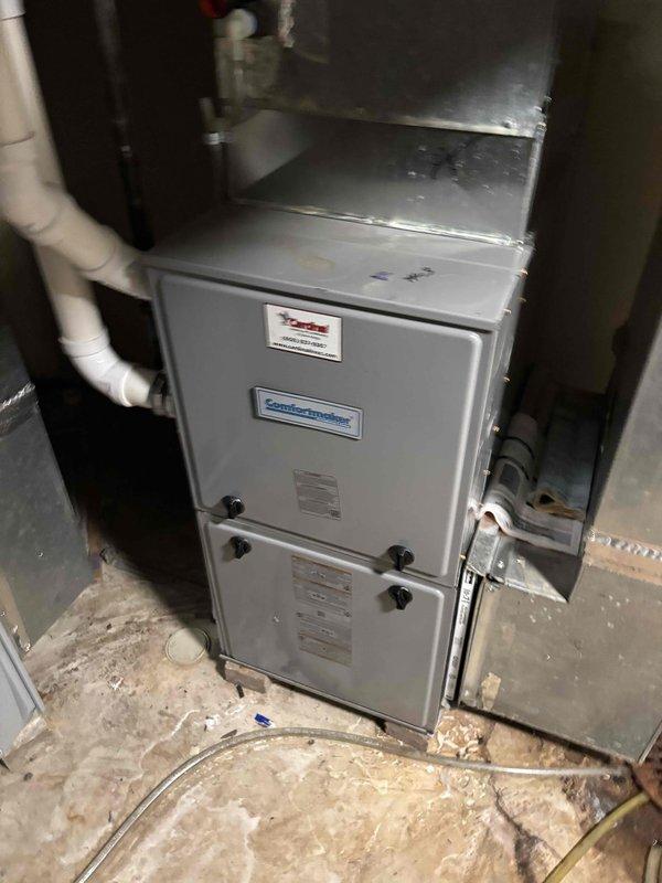 Responded to no heat call and identified improperly wired thermostat causing system malfunction and overheating of conditioned space. Diagnosed incorrect wiring configuration on Honeywell Home thermostat connected to ComfortMaker furnace unit. Corrected thermostat wiring per manufacturer specifications and replaced blown fuse. Verified proper system operation, confirmed heating cycle functionality, and ensured thermostat communication with furnace. System restored to normal operation with accurate temperature control.