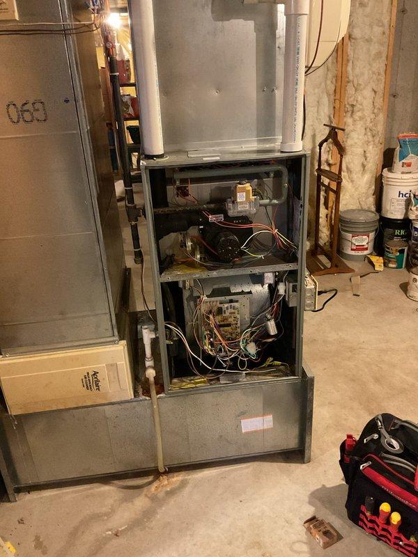 Responded to no heat call where thermostat was reported as not working. Upon inspection, diagnosed failed capacitor on the draft inducer motor. Removed defective inducer assembly and installed new replacement inducer motor. Verified proper operation of furnace, confirmed ignition sequence, and tested heating cycle. Unit restored to normal operation with adequate heat output.