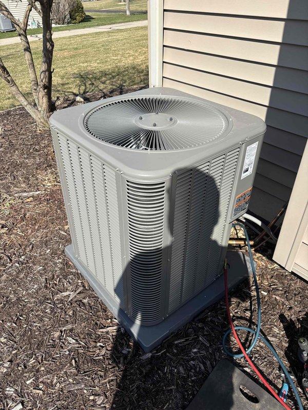 Performed seasonal startup and system check on outdoor air conditioning unit. Connected manifold gauges to measure refrigerant pressures and verified system operating parameters using digital HVAC diagnostic equipment. Inspected soldered refrigerant line joint per customer concern regarding appearance; joint appears cosmetically discolored but remains structurally sound with no active leaks detected. All system pressures and temperatures reading within normal operating range for R454B refrigerant. Unit cycling properly and providing adequate cooling.