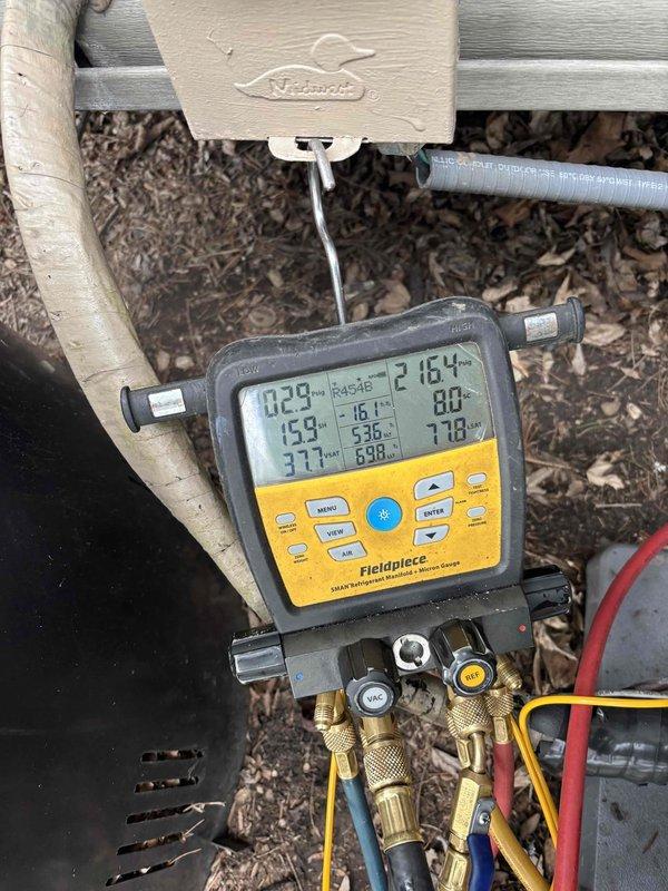 Performed seasonal startup and system diagnostic on Lennox residential air conditioning unit. Connected Fieldpiece digital manifold gauges to measure refrigerant pressures and temperatures across the system. All readings were within normal operating parameters, confirming proper refrigerant charge and system performance. Unit activated successfully and running as designed.