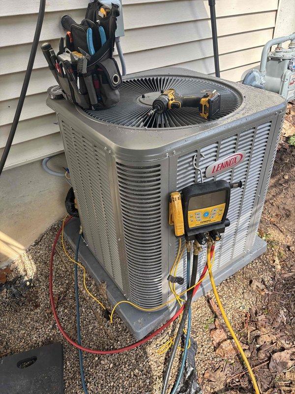 Completed installation of new Lennox condensing unit on existing concrete pad. Set condenser on site, connected refrigerant lines, and performed system startup procedures. Utilized digital manifold gauges to verify system pressures and temperatures across suction and liquid lines, confirming proper refrigerant charge and operational parameters. All readings stabilized within manufacturer specifications for optimal system performance.