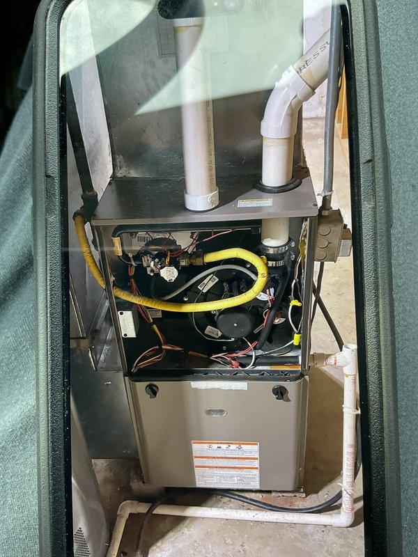 Responded to gas leak call on residential furnace system. Upon inspection, identified gas leaking through the gas valve into the burners. Replaced defective gas valve and gas supply whip. Performed combustion analysis with CO reading of 7 ppm, which is within acceptable limits. Verified proper ignition and burner operation. Conducted thorough leak check of furnace cabinet and blower compartment with no additional leaks detected. Unit returned to safe operating condition.