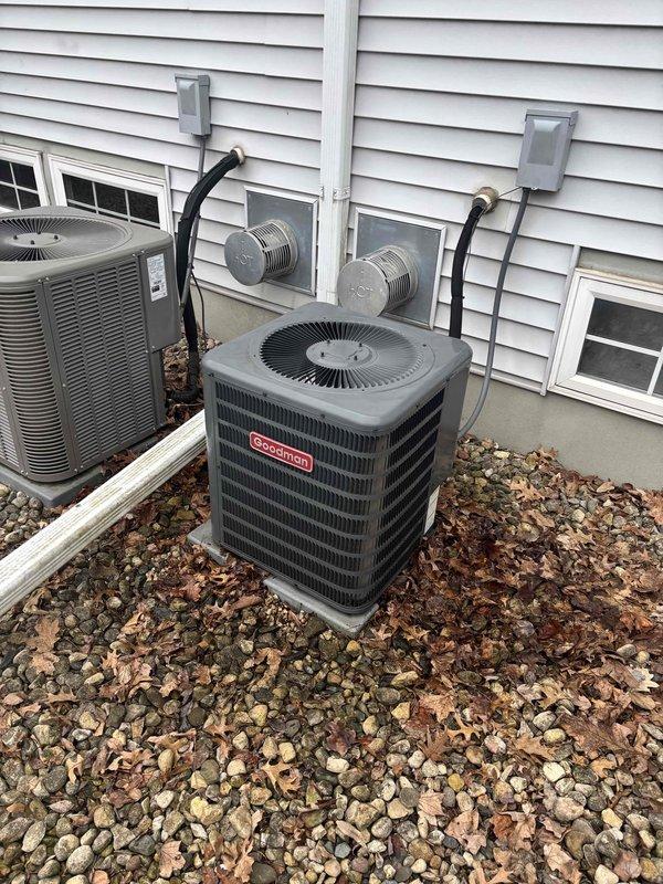 Performed seasonal clean and check maintenance on Goodman air conditioning system per customer's online coupon request. Following COVID safety protocols for immune-compromised occupant, completed exterior preventive maintenance service including inspection of condenser unit, cleaning of coils, and system performance verification. All components found operating within normal parameters with no deficiencies noted.
