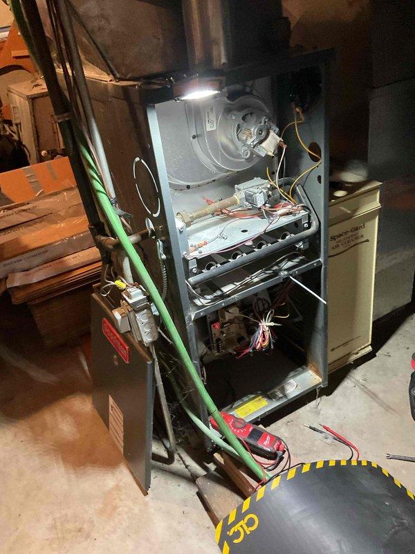 Responded to no heat call on residential furnace system. Upon arrival, confirmed system was not operating and homeowner reported heat cut out that morning with no prior warning. Performed diagnostic evaluation of furnace and control system to identify cause of failure.

Troubleshooting revealed faulty thermostat preventing proper communication between control and heating equipment. Further inspection identified defective thermostat backplate contributing to system malfunction. Removed failed thermostat and damaged backplate from wall mounting location.

Installed new thermostat and new backplate, ensuring proper wire connections and secure mounting. Verified all low-voltage wiring connections were correct and secure at both thermostat and furnace terminal points. Powered system back on and tested thermostat functionality through multiple heating cycles.

Confirmed furnace ignition sequence operated correctly, burners lit properly, and blower motor engaged as designed. Verified adequate