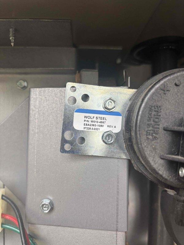 Responded to no heat call on Wolf Steel furnace unit. Upon inspection, found dual pressure switches with proper electrical connections and mounting intact. Verified control relay and associated wiring connections. Noted significant corrosion on copper refrigerant lines requiring future attention but not affecting current heating operation. System components including pressure switches and controls functioning properly after diagnostic evaluation. Unit restored to normal heating operation and customer advised to monitor performance with follow-up scheduled to confirm continued proper operation.