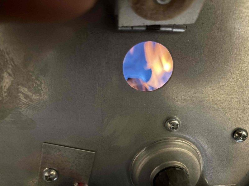 Responded to no-heat call on RV furnace unit. Previous service provider had diagnosed failed igniter with zero ohm reading. Confirmed diagnosis and replaced defective igniter. Verified proper combustion with blue flame established in burner chamber. Tested unit operation and confirmed heating system restored to full functionality.