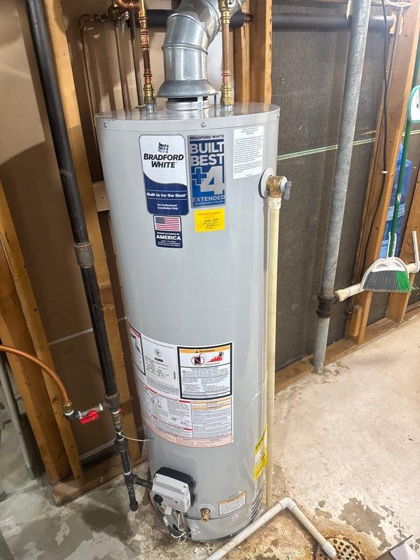 Responded to callback for gas leak on recently installed Bradford White water heater. Detected gas leaking from gas valve assembly at vent connection. Replaced defective gas valve under manufacturer warranty, verified proper operation, and confirmed no further leaks detected upon completion.