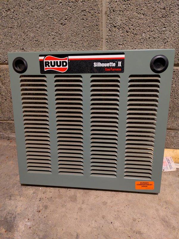 Responded to no-heat call on Ruud Silhouette II gas furnace. Upon inspection, found failed inducer motor, cracked heat exchanger with visible corrosion and rust deterioration, and defective pressure switch. Due to safety concerns from compromised heat exchanger and extent of component failures, recommended and installed new furnace system with proper vent liner to ensure safe operation and code compliance.
