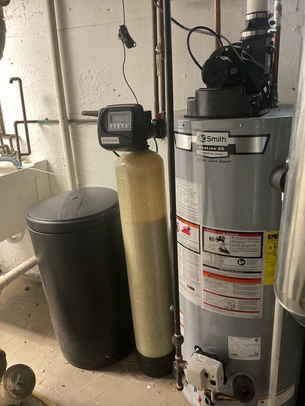 Completed bi-annual preventive maintenance inspection on residential gas furnace and water softener system. Performed comprehensive furnace check including visual inspection of blower motor assembly, electrical connections, gas supply line and shut-off valve, and ductwork connections. Verified proper operation of all internal components with access panel opened for thorough examination. Conducted water softener inspection including evaluation of control head functionality and overall system condition. All equipment found to be operating within normal parameters at time of service.