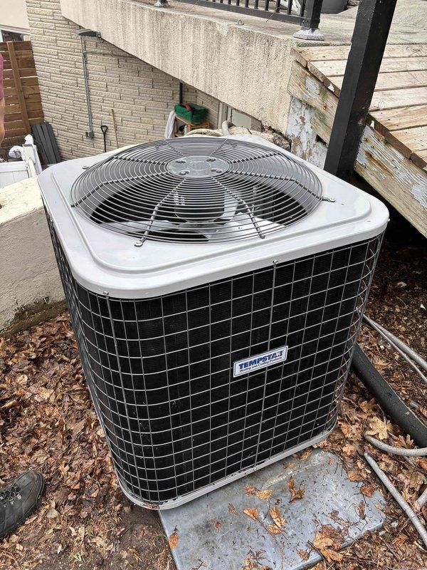 Responded to no cooling complaint in pro shop area of building. Upon arrival, verified lack of cooling in affected zone while other areas maintained proper operation. Performed system diagnostics on Tempstar condensing unit serving the space. Measured temperature differential across evaporator coil, recording supply air temperatures of 11.1°F and 9.2°F delta T, indicating inadequate heat removal. Inspected outdoor condenser unit, confirmed fan operation and normal compressor function. System requires further evaluation for potential refrigerant charge issues or airflow restrictions affecting cooling capacity in the isolated zone.