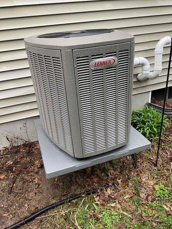 Performed seasonal start-up on Lennox air conditioning condenser unit following recent installation. Verified refrigerant charge levels were correct and within manufacturer specifications. Secured armor flex conduit with wire ties to ensure proper cable management and protection of electrical connections.