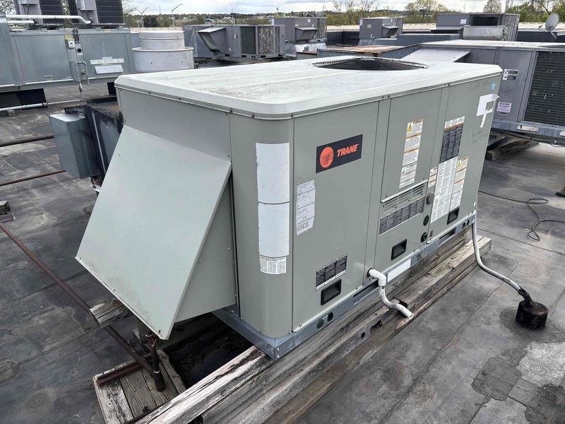 Responded to no cooling complaint on rooftop package unit serving kitchen area. Upon inspection, found severely clogged air filter restricting airflow to the system. Removed and replaced heavily contaminated filter with substantial dust and debris buildup that had accumulated over extended period. Filter obstruction was preventing proper air circulation through the Trane package unit, resulting in inadequate cooling performance. Unit tested after filter replacement and confirmed restored airflow and proper cooling operation.