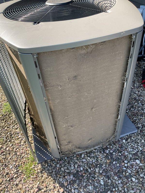 Responded to no cooling condition with error code 411 low pressure lockout on dual AC system. Found both outdoor condenser units heavily soiled with accumulated dirt and debris from lack of maintenance over previous two years. Performed thorough cleaning of both condenser coils and units to restore proper airflow and heat transfer. Upon completion of cleaning, conducted operational testing of both systems. Unit #1 measured 15°F delta T and Unit #2 measured 19°F delta T, both within acceptable cooling performance parameters. Performed complete system inspection and checkout on both units to verify proper operation and clearance of fault codes.