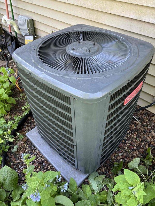 Completed air conditioning clean and check on outdoor condenser unit. Performed routine maintenance inspection with no issues identified. Unit operational and functioning within normal parameters. Temperature measurements verified proper system operation.