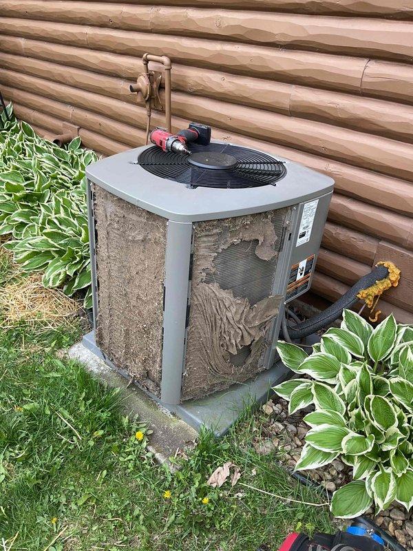 Responded to service call for air conditioning system not operating properly. Upon arrival, found Lennox outdoor condensing unit with heavy dirt accumulation and debris buildup due to lack of maintenance over extended period. Performed thorough cleaning of condenser coils, cabinet panels, and fan assembly to restore proper airflow and heat transfer efficiency. Inspected refrigerant lines, electrical connections, and mechanical components for proper operation. Checked indoor furnace system for any related issues. Verified system operation and confirmed unit cooling properly after cleaning and inspection completed.