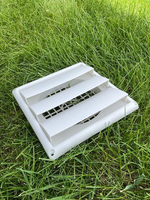 Responded to service call regarding exterior wall vent with bird intrusion issue. Upon inspection, found damaged vent cover on residential exterior allowing wildlife access to ductwork system. Removed compromised vent grille from siding-mounted opening and replaced with new white louvered vent cover featuring proper screening to prevent future bird entry while maintaining adequate airflow. Verified secure mounting and proper seal to building envelope.