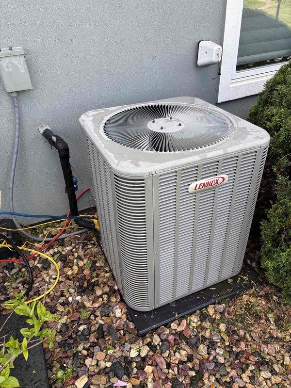 Completed routine maintenance and inspection on Lennox air conditioning system. Performed system cleaning, verified proper operation of all components, and recorded temperature differential readings of 52.6°F and 59.8°F across the system. Unit operating within normal parameters with no issues identified.