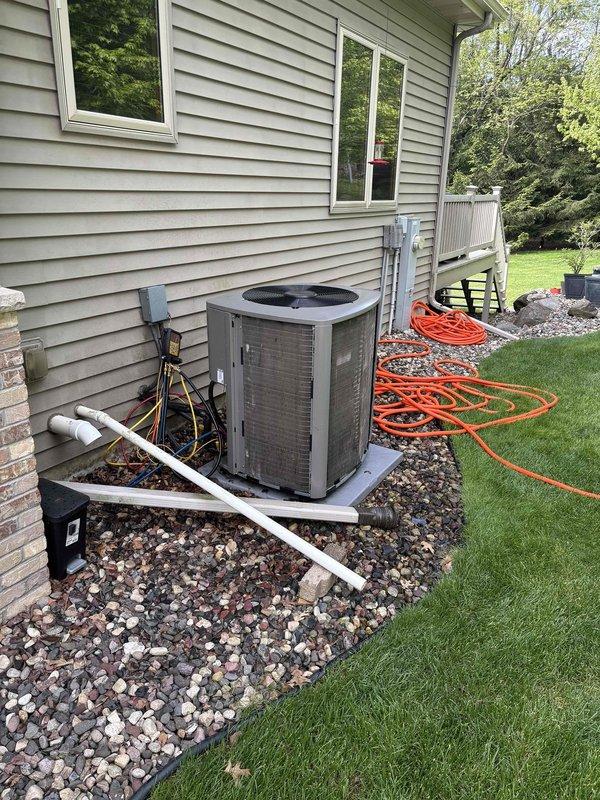Completed prepaid clean and check maintenance on residential air conditioning system. Performed thorough cleaning of outdoor condenser unit, removing accumulated dust, debris, and grime from mesh filter panels and coil surfaces. Inspected condenser fan operation, electrical connections at disconnect box, and refrigerant line set. Verified proper drainage through condensate lines and checked all exterior components for wear or damage. Unit operational and running within normal parameters upon completion of maintenance service.