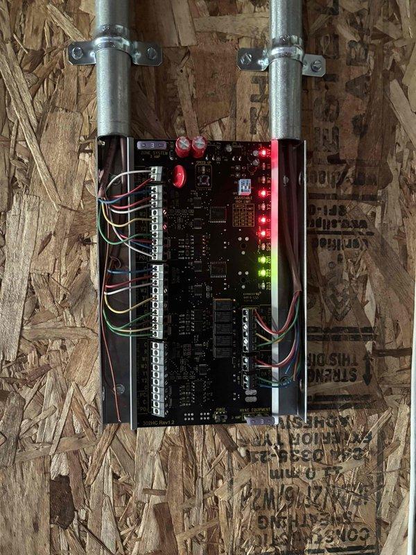 Returned to complete check and charge service that was previously interrupted due to cold ambient temperatures. Rechecked refrigerant charge on system and verified proper levels. Inspected motorized damper actuator installation and wiring connections in ductwork. Verified control board operation with all LED indicators functioning properly. System operating within normal parameters.