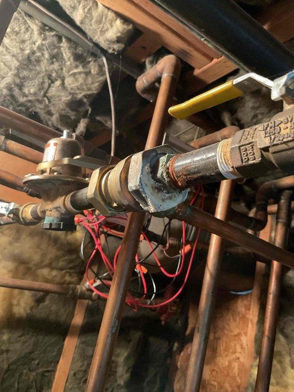Responded to a repeat service call for a malfunctioning zone valve on a residential boiler heating system. Diagnosed a failed Erie zone valve pop top that was preventing proper zone operation. Replaced the defective Erie pop top with a new unit, restoring proper zone control and system functionality.