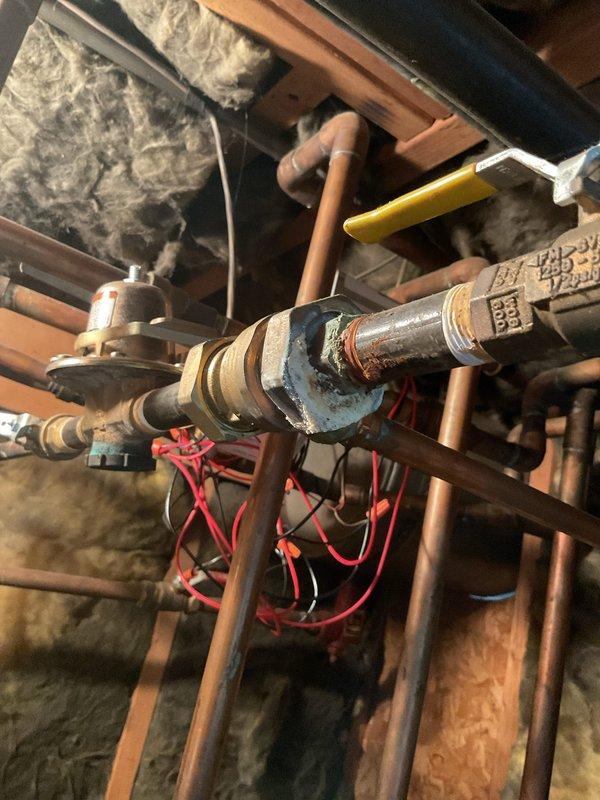Responded to a repeat service call for a malfunctioning zone valve on a residential boiler heating system. Diagnosed a failed Erie zone valve pop top that was preventing proper zone operation. Replaced the defective Erie pop top with a new unit, restoring proper zone control and system functionality.