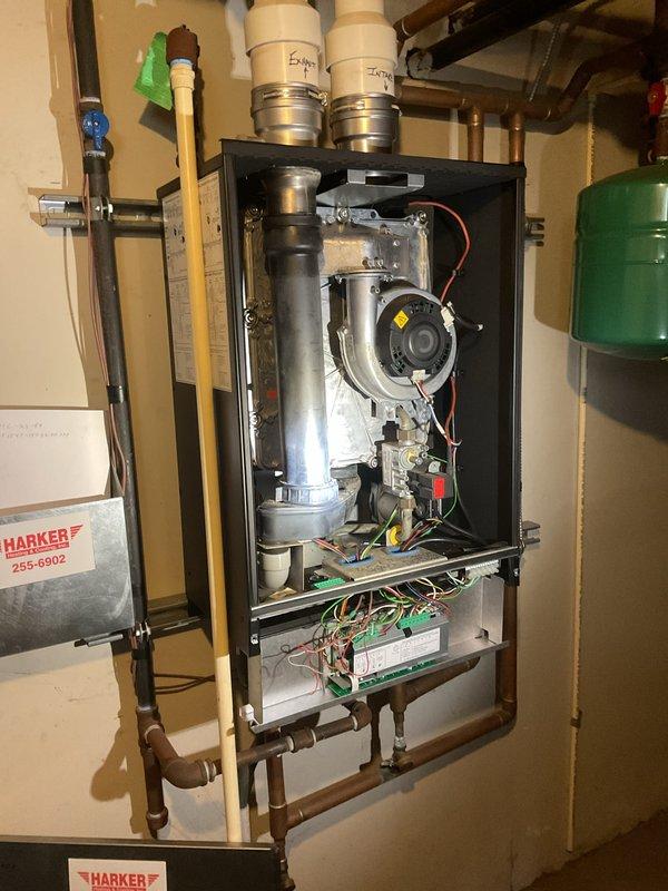 Responded to service call for boiler repair. Upon inspection, found the existing control board exhibited severe corrosion with yellowish-white crusty buildup across multiple solder joints and component areas, compromising system operation. Removed and replaced the failed control board with new unit. Reconnected all electrical connections to the new board, verified proper wiring configuration, and tested system operation to ensure boiler functionality was fully restored.